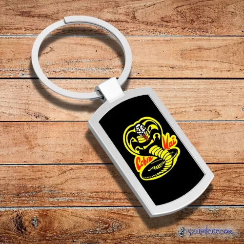 Metalowy brelok z logo Cobra Kai